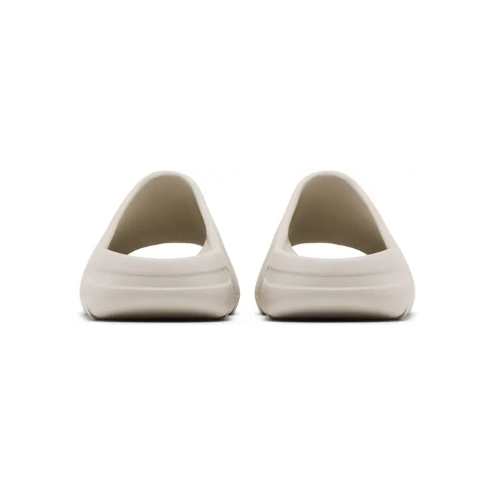 Pair of cream Yeezy Slides rear view