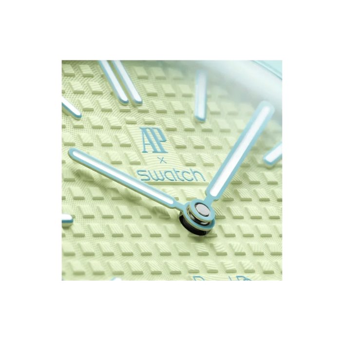 Close-up of a Swatch watch face
