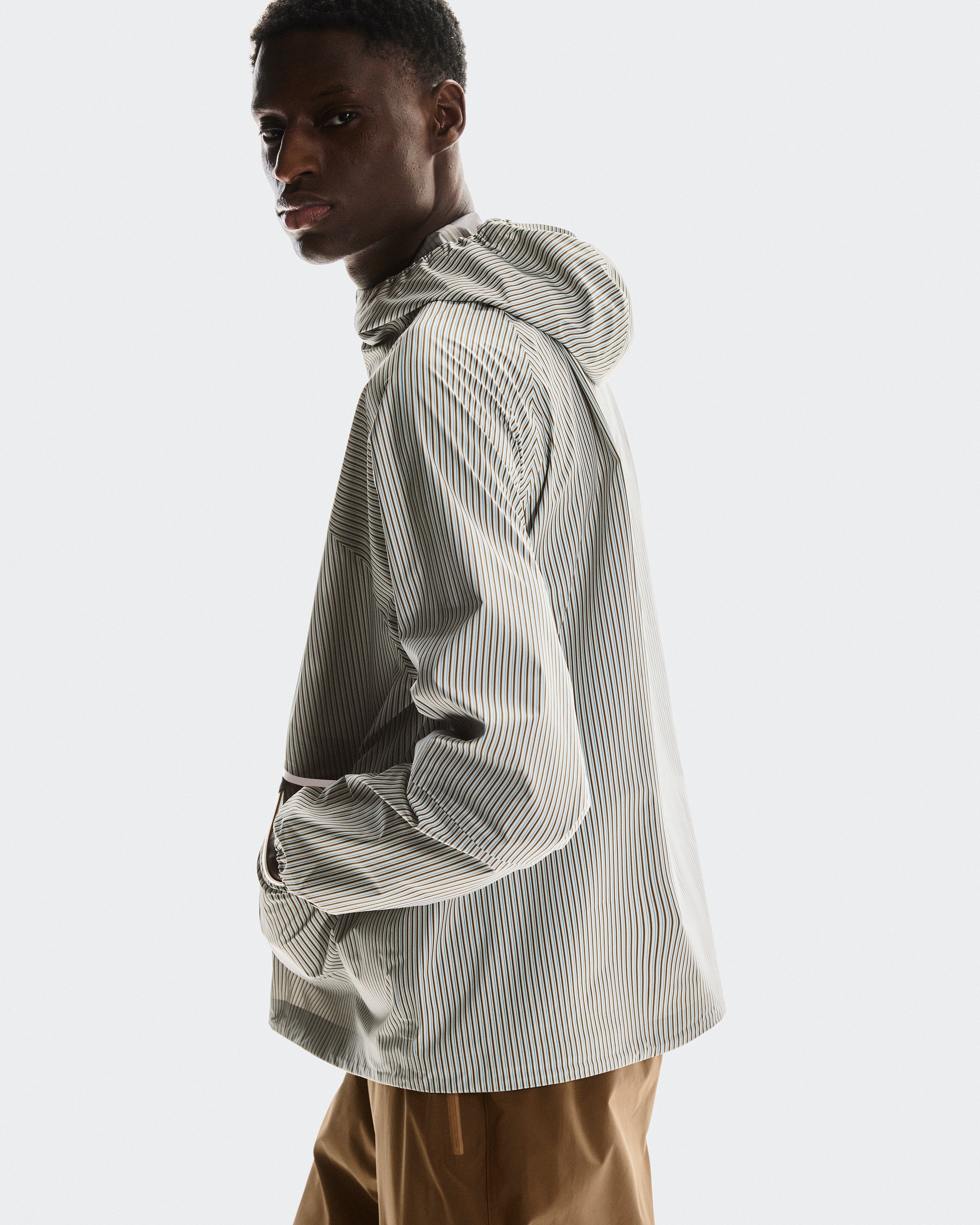 On Storm Anorak Loewe Beige | Blue