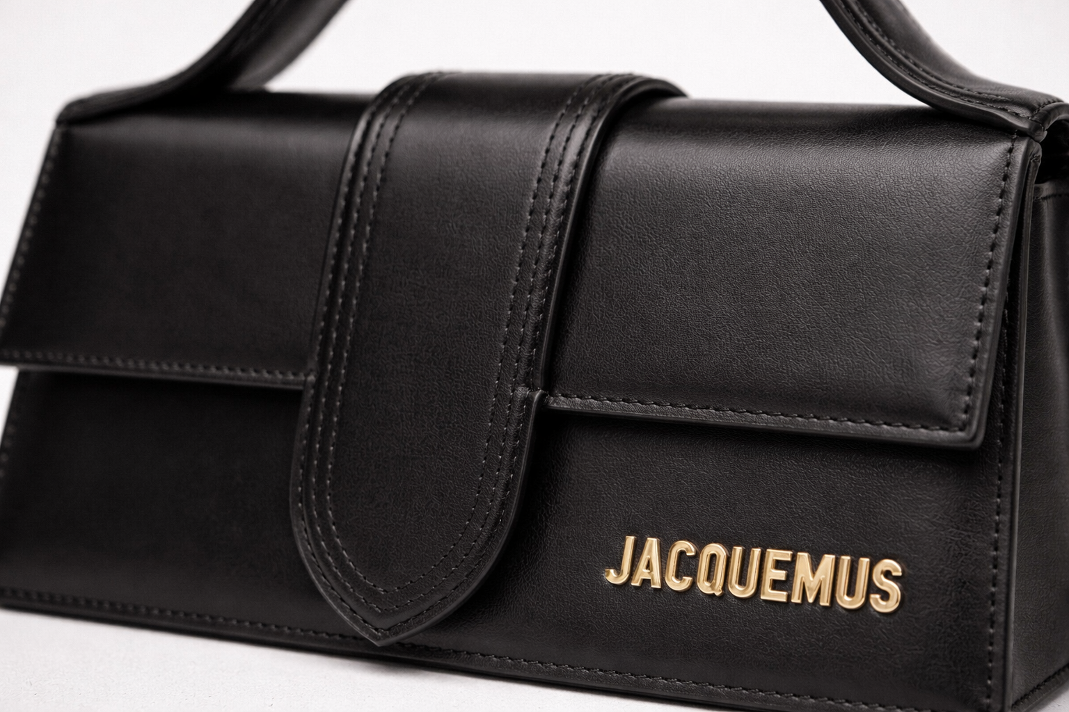 Jacquemus Black with Gold Initials Le Grand Bambino ( with dustbag only)