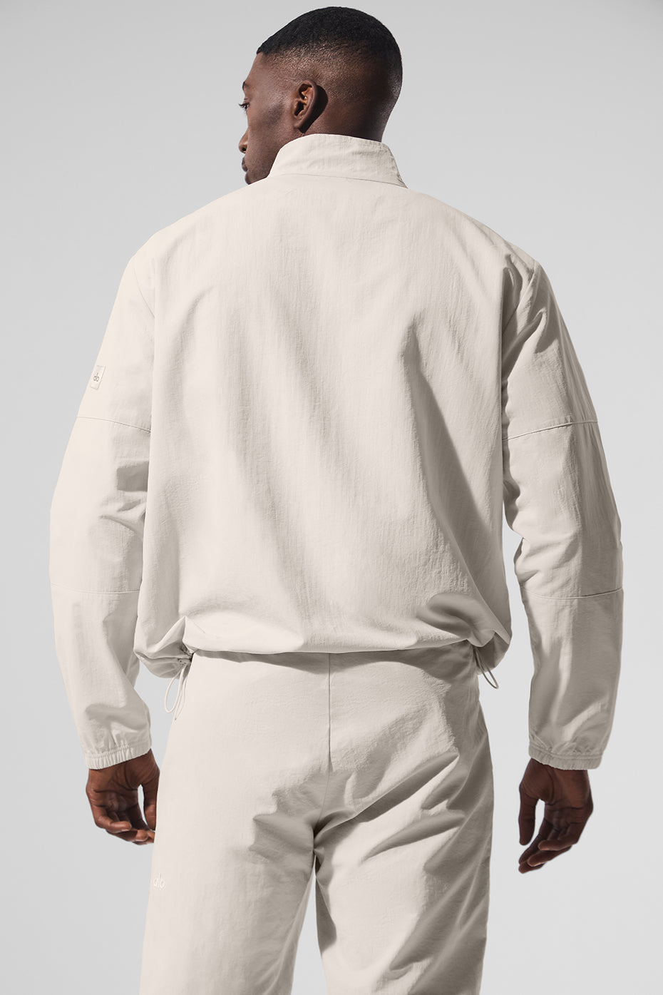 Alo Yoga Light Weight Takeaway Track Pullover - Bone
