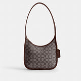 Coach Curve Zip Bag In Signature Jacquard Brass Oak Maple