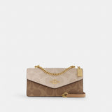 Coach Klare Envelope Crossbody Bag In Blocked Signature Canvas Gold Sand Tan