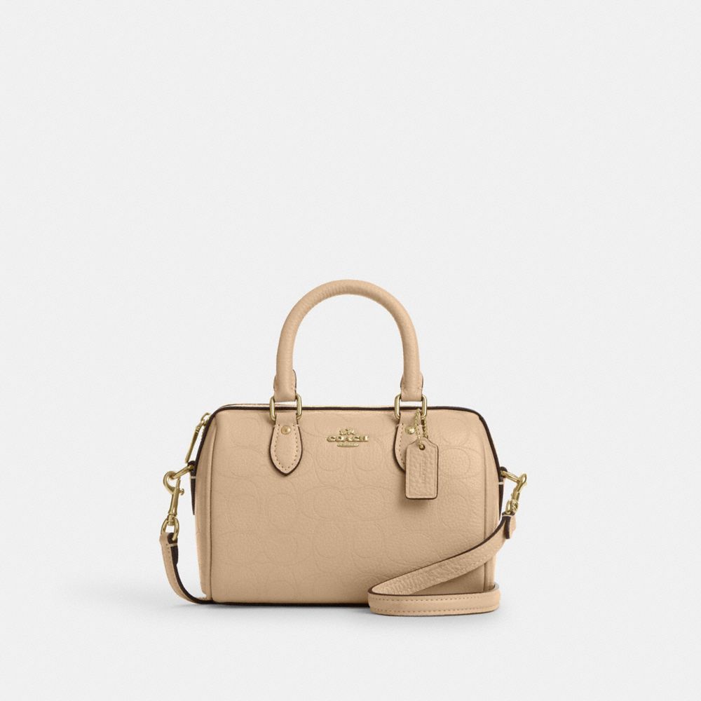 Coach Mini Rowan Crossbody Bag In Signature Leather Gold Oat