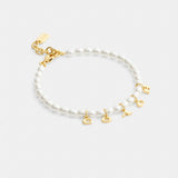 Coach Coach Charms Pearl Bracelet Gold Pearl