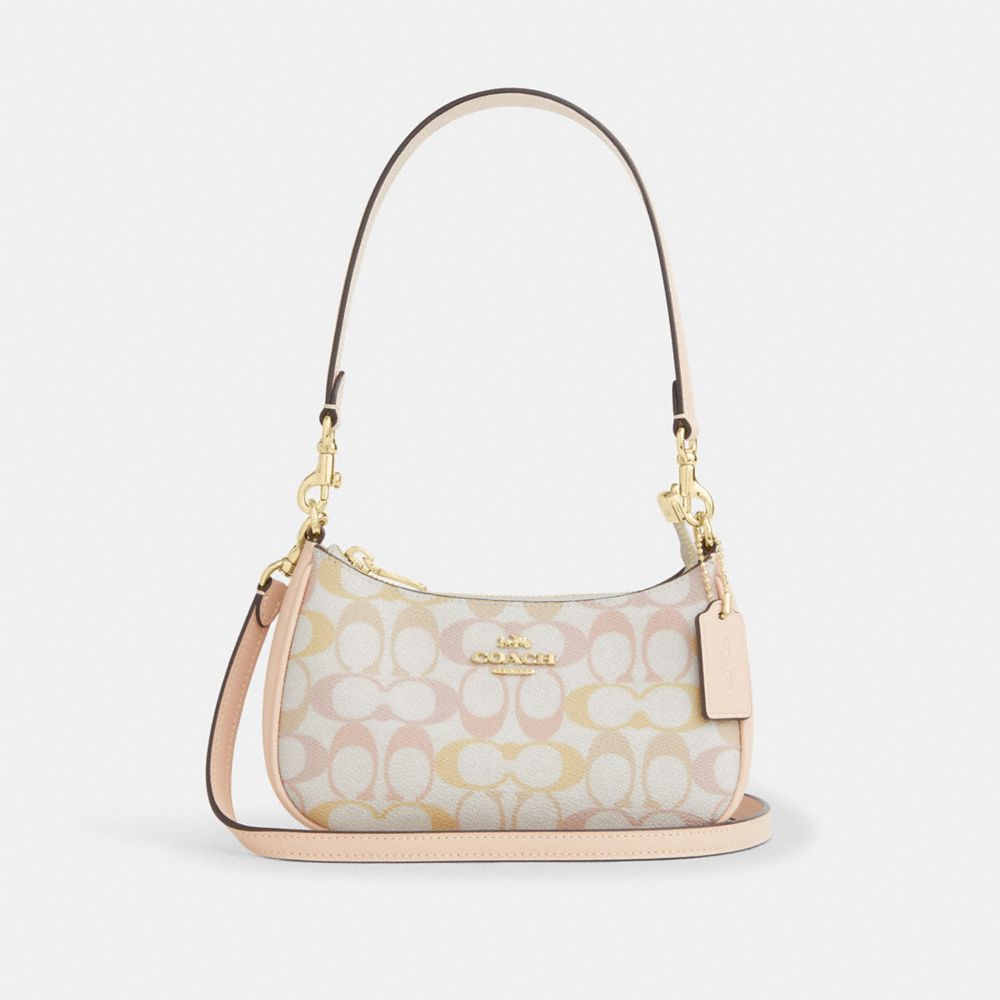 Coach Teri Mini Crossbody Bag In Signature Canvas Gold Chalk Pink