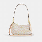 Coach Teri Mini Crossbody Bag In Signature Canvas Gold Chalk Pink