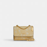 Coach Mini Klare Crossbody Bag With Floral Print Gold Washed Yellow