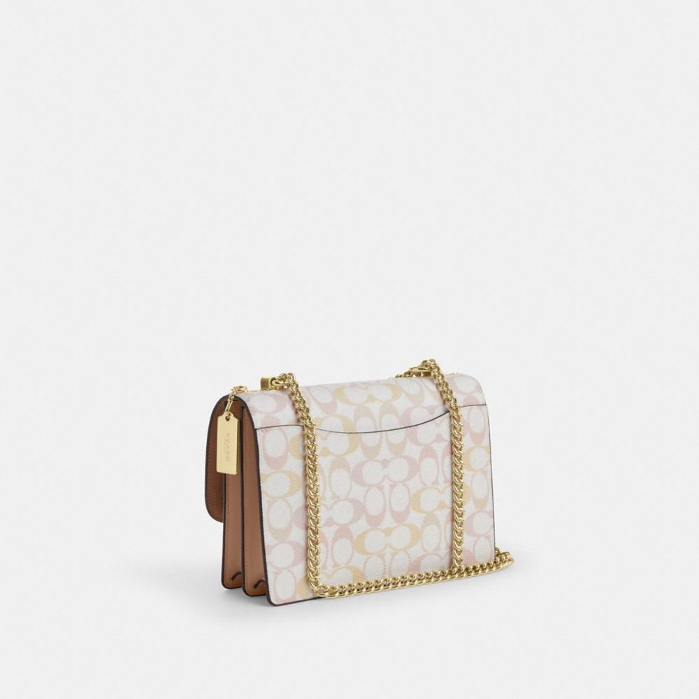 Coach Klare Crossbody Bag In Signature Canvas Gold Chalk Pink