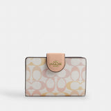 Coach Medium Corner Zip Wallet In Signature Canvas Gold Chalk Pink