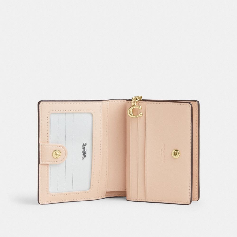 Coach Snap Wallet In Signature Canvas Gold Chalk Pink
