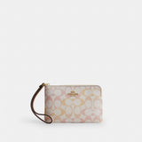 Coach Corner Zip Wristlet In Signature Canvas Gold Chalk Pink