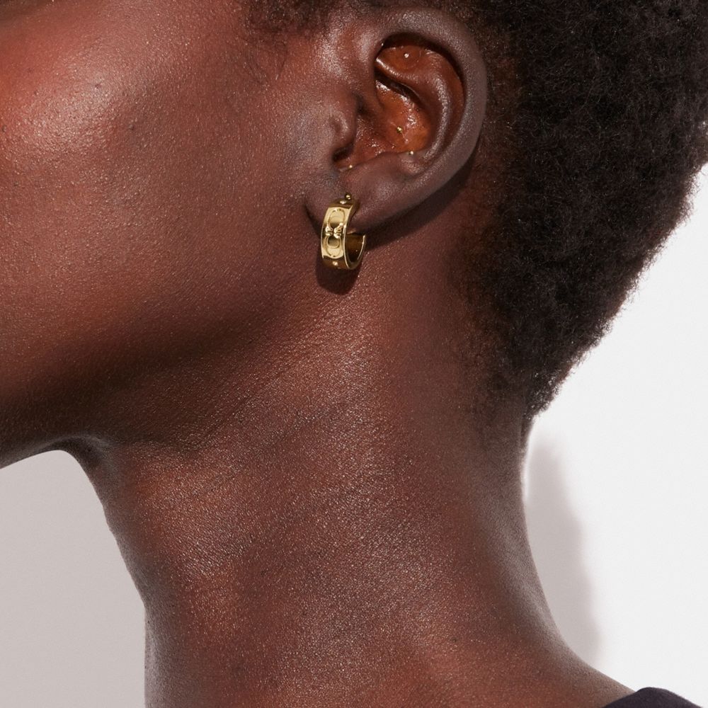 Coach Signature Huggie Earrings Gold