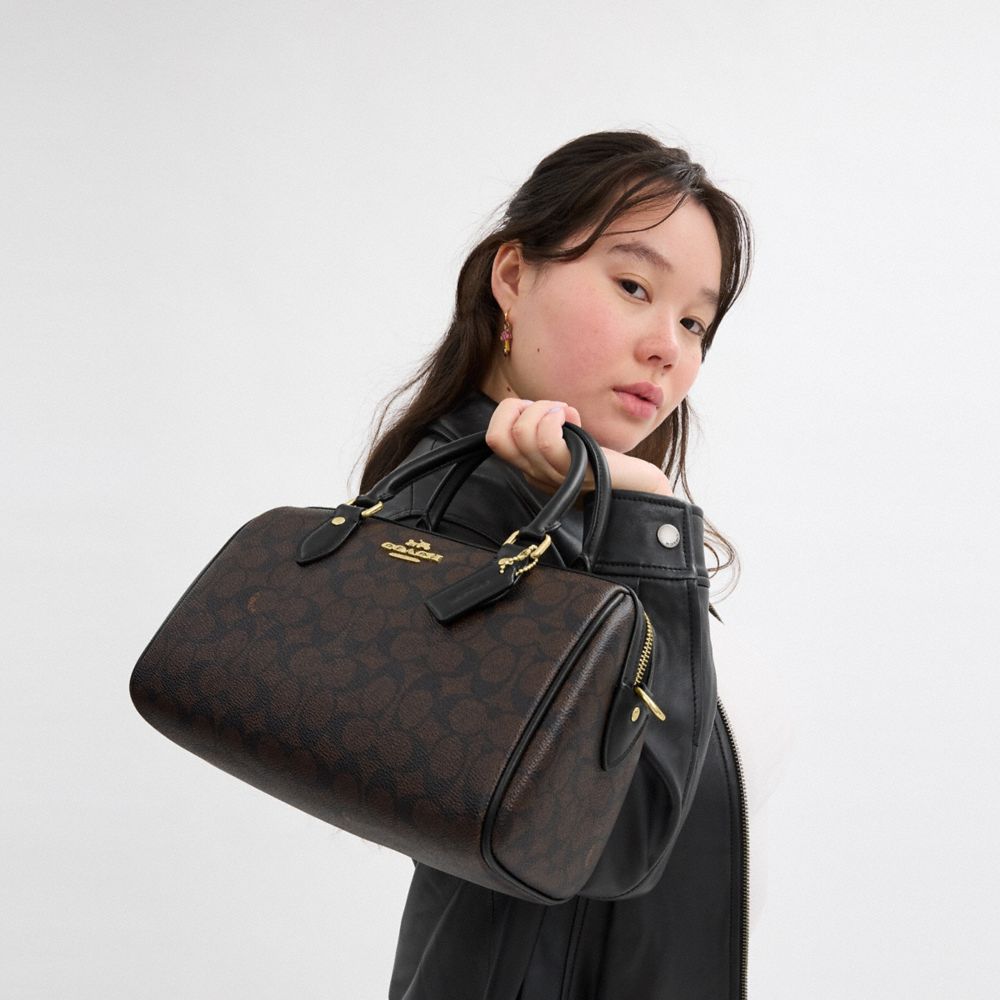 Coach Rowan Satchel Bag In Signature Canvas Gold Walnut Black