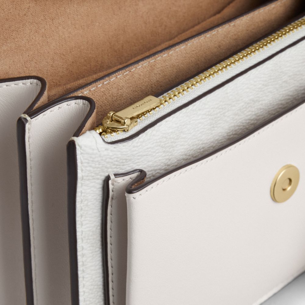 Coach Mini Klare Crossbody Bag In Signature Canvas Gold White Chalk