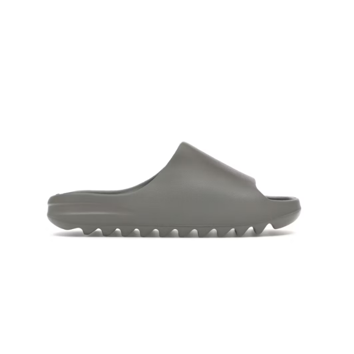 Grey Yeezy Slide side view with sole design