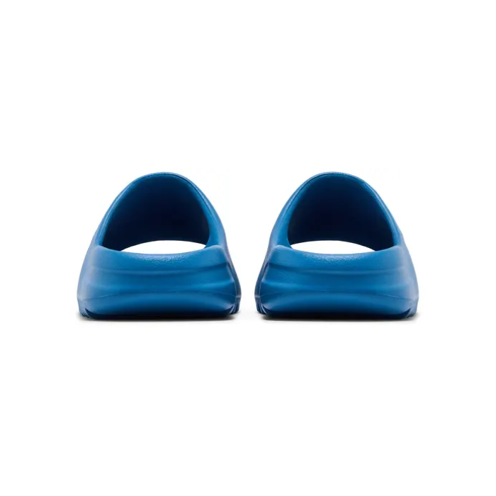 Rear view of blue Yeezy Slides pair