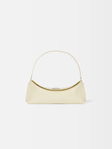 Jacquemus The Ovalo Clutch Shoulder Bag In Glazed Leather Dusty Yellow