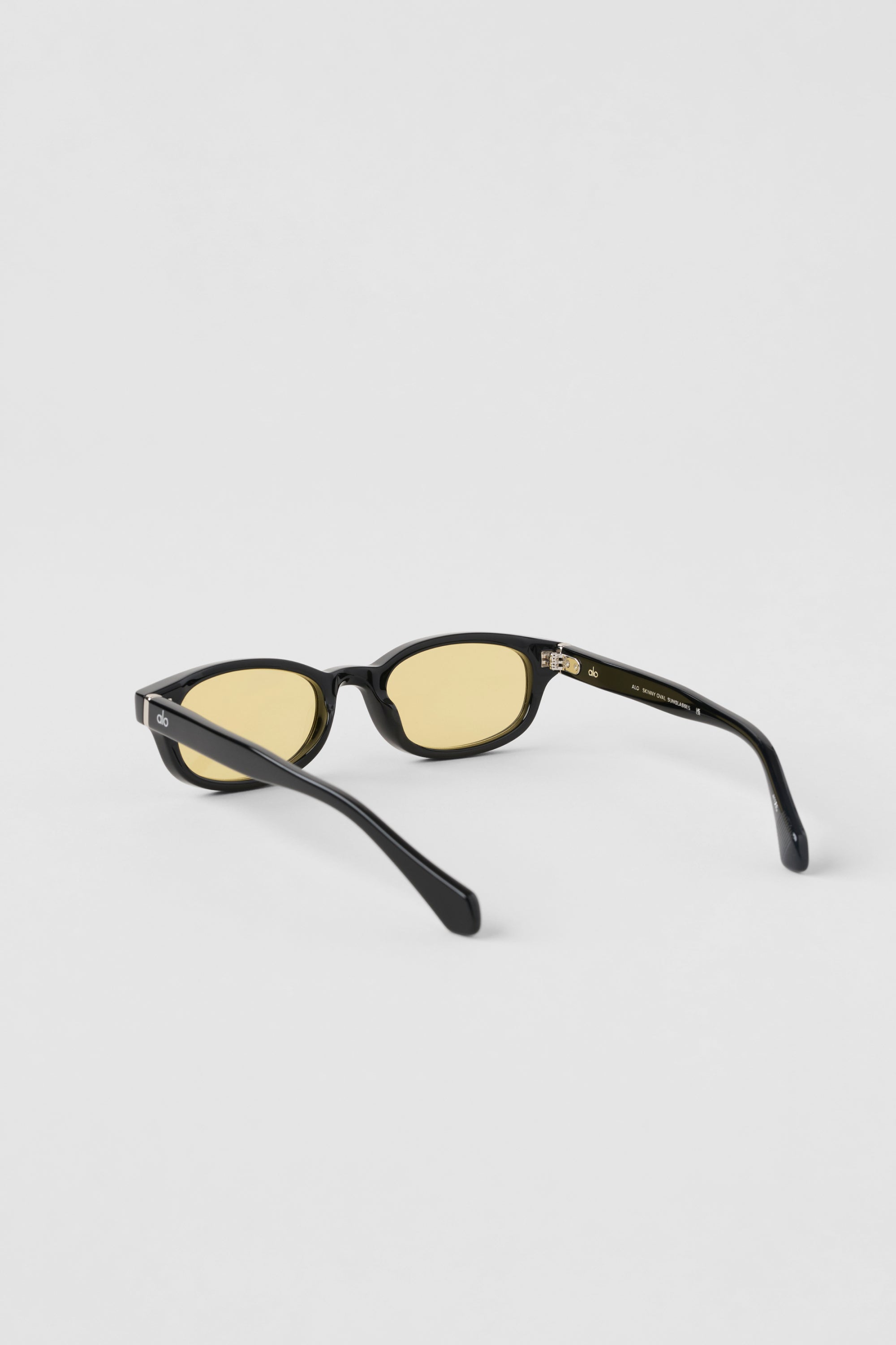 Alo Yoga ALO Skinny Oval Sunglasses - Black/Yellow