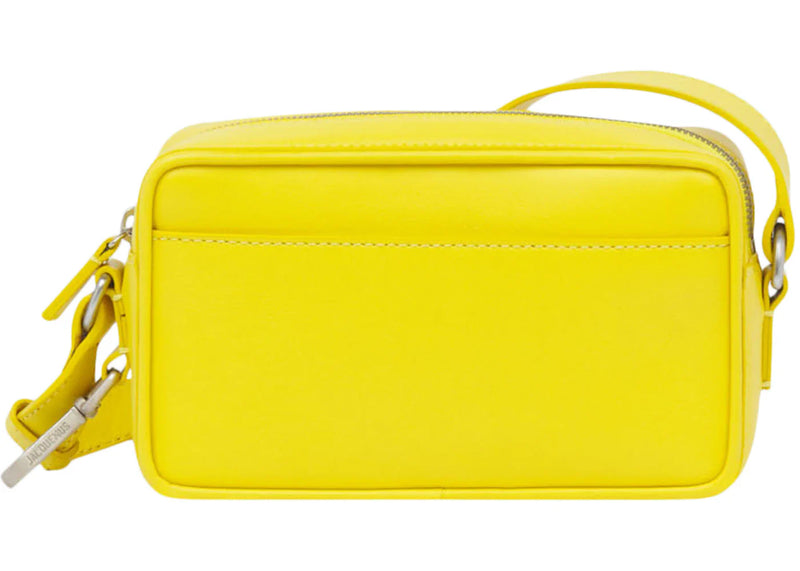 jacquemus le baneto strapped pochette bag yellow