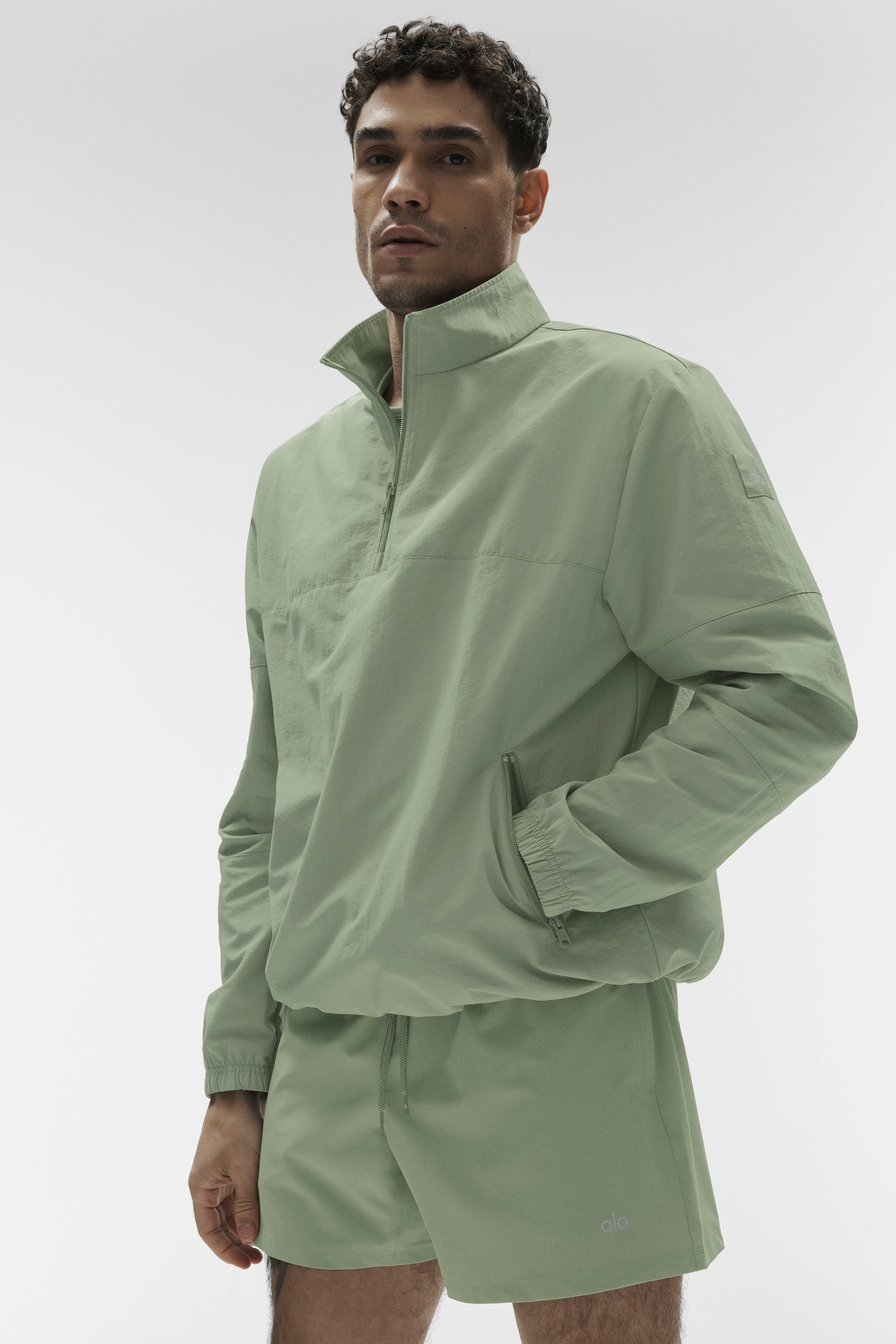 Alo Yoga Light Weight Takeaway Track Pullover - Dune Grass