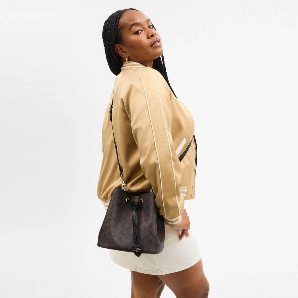 Coach Rowan Bucket Bag In Signature Canvas Gold Walnut Black
