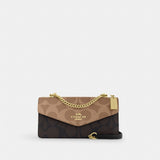 Coach Klare Envelope Crossbody Bag In Blocked Signature Canvas Gold Walnut Tan
