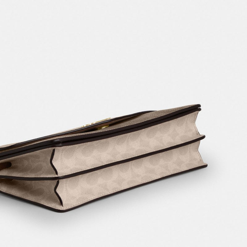 Coach Klare Envelope Crossbody Bag In Blocked Signature Canvas Gold Sand Tan