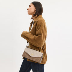 Coach Klare Envelope Crossbody Bag In Blocked Signature Canvas Gold Sand Tan