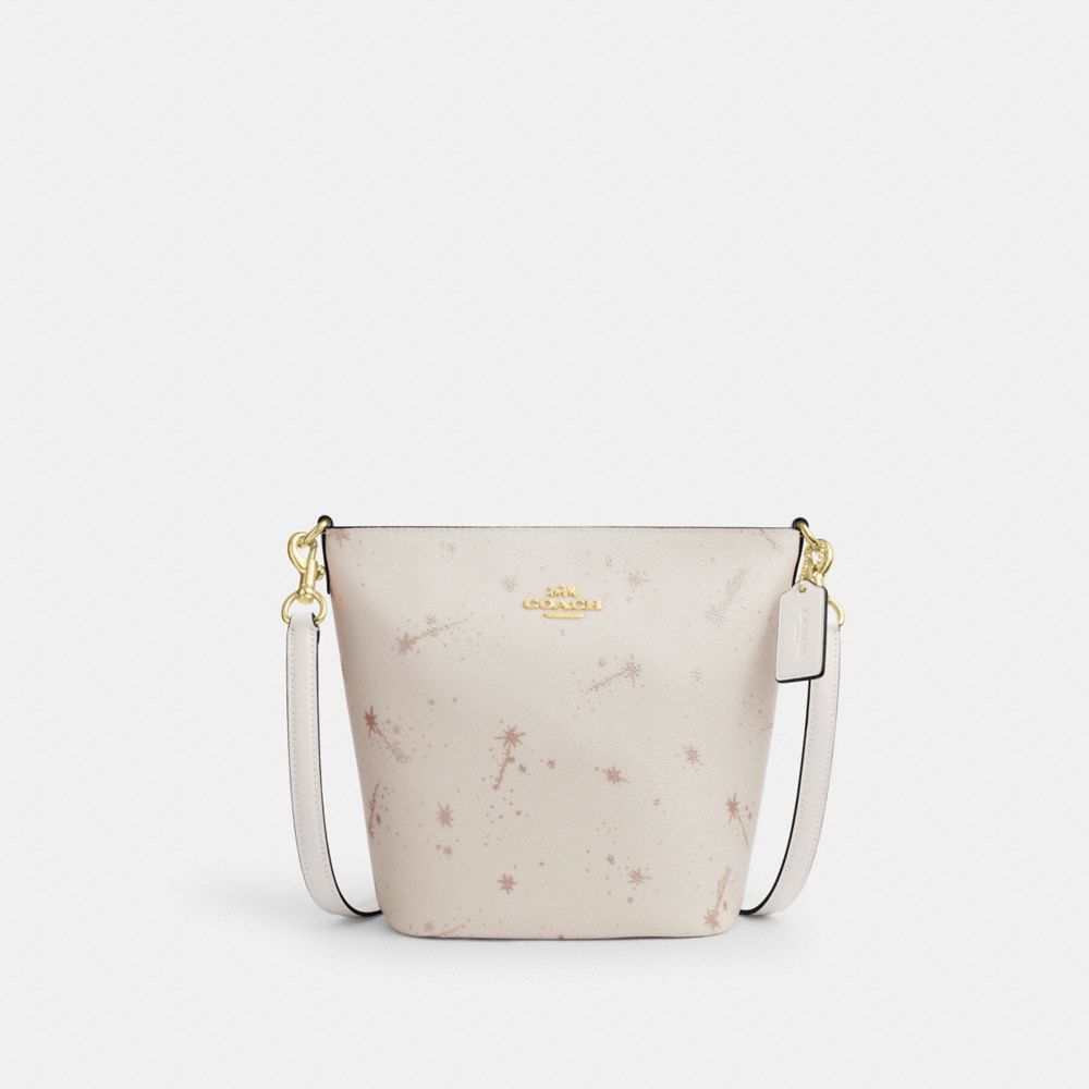 Coach Logan Duffle Bag With Star Print Gold Chalk Multi
