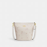 Coach Logan Duffle Bag With Star Print Gold Chalk Multi