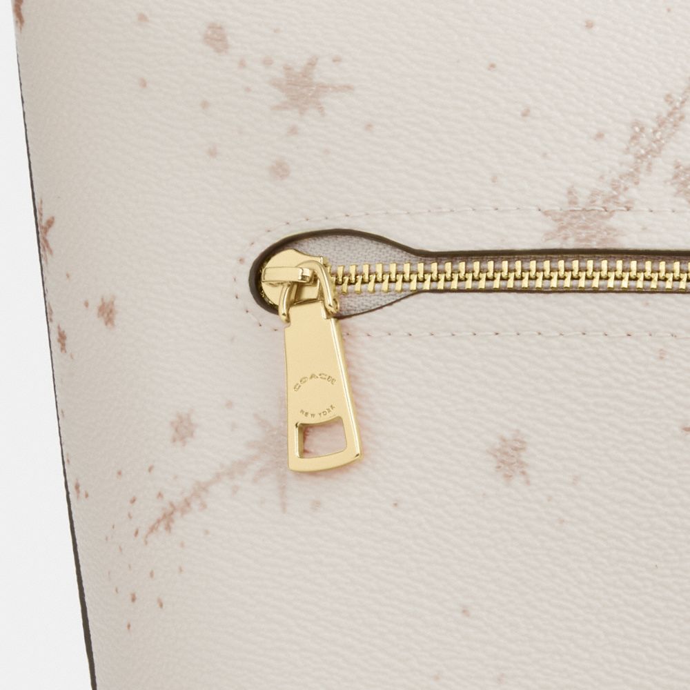 Coach Logan Duffle Bag With Star Print Gold Chalk Multi