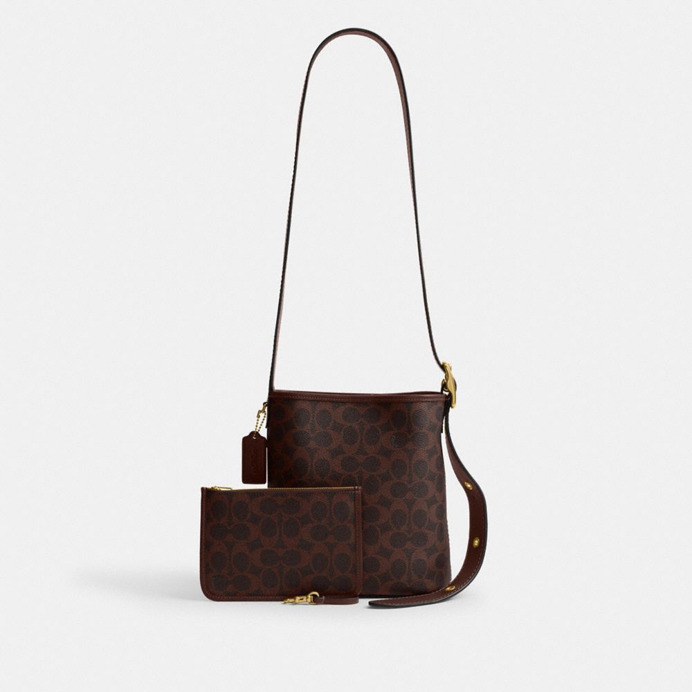 Coach Bleecker Bucket Bag 21 In Signature Canvas Brass Maple