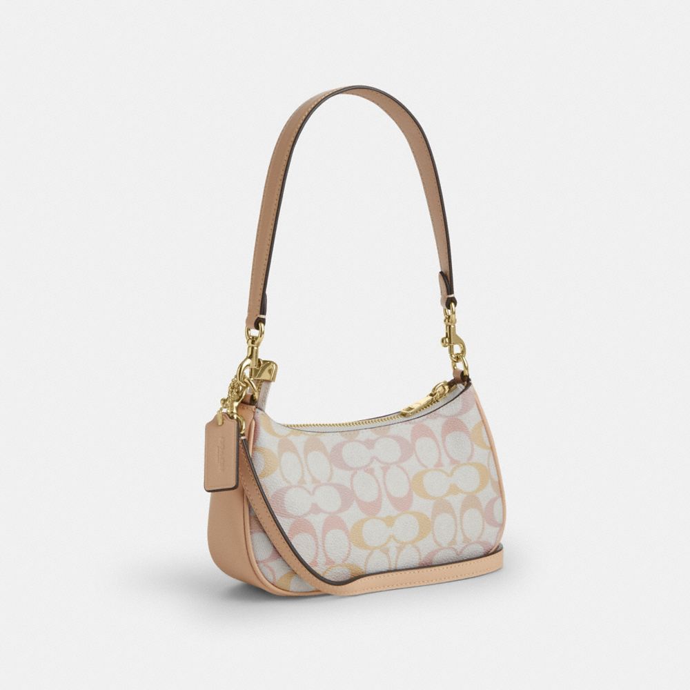 Coach Teri Mini Crossbody Bag In Signature Canvas Gold Chalk Pink