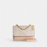 Coach Klare Crossbody Bag In Signature Canvas Gold Chalk Pink