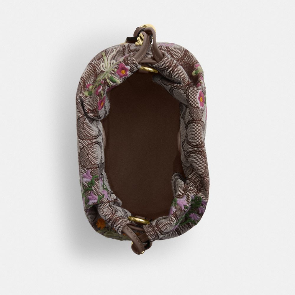 Coach Faye Mini Drawstring Bag In Signature Jacquard With Floral Embroidery Gold Oak Multi