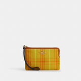 Coach Corner Zip Wristlet In Regenerative Cotton With Plaid Print Gold Burnished Amber