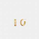 Coach Repeated C Huggie Earrings Gold