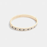 Coach Signature Enamel Hinged Bangle Gold White