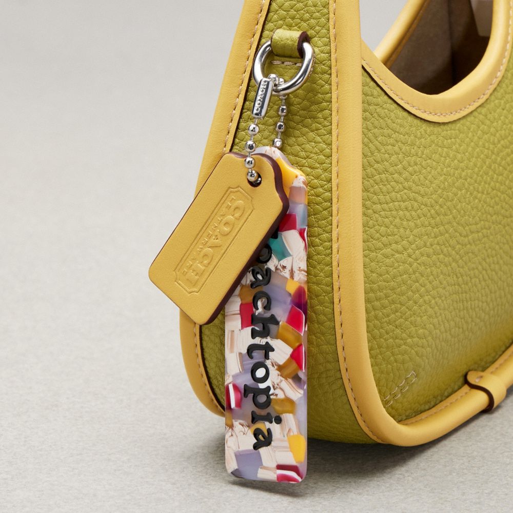 Coach Mini Ergo Bag In Coachtopia Leather Lime Green Sunflower