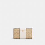 Coach Slim Zip Wallet In Signature Canvas With Stripe Gold Light Khaki Chalk Lt Saddle