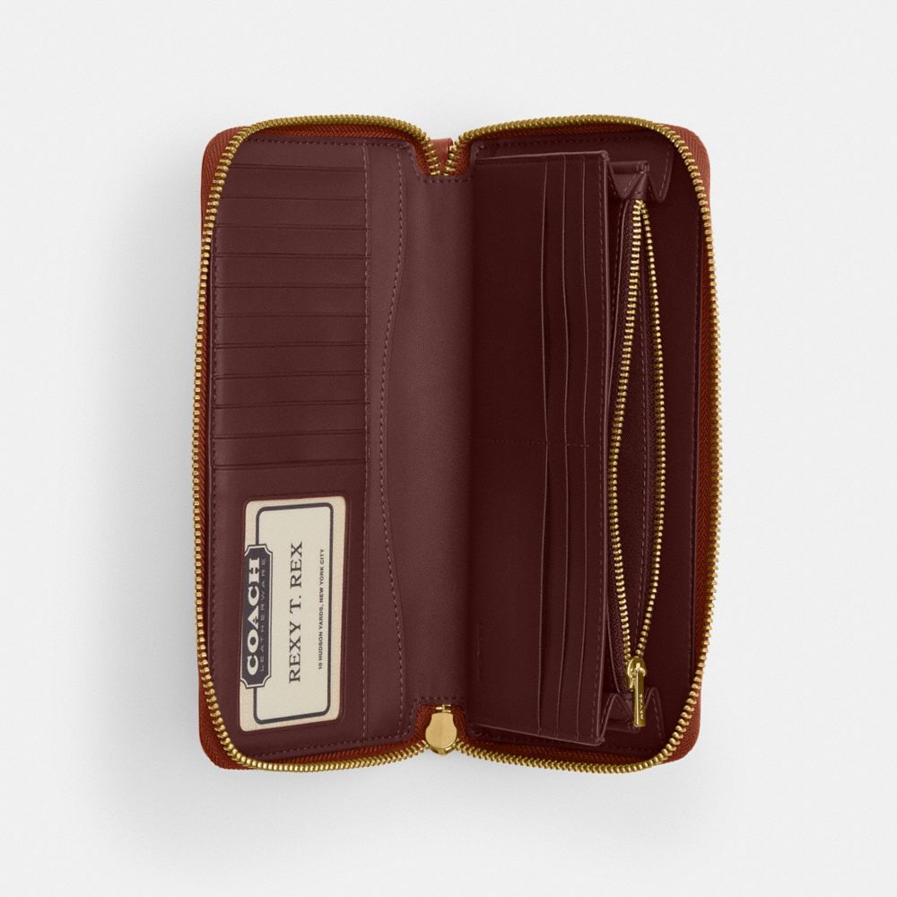 Coach Essential Continental Wallet In Signature Canvas Brass Tan Caramel
