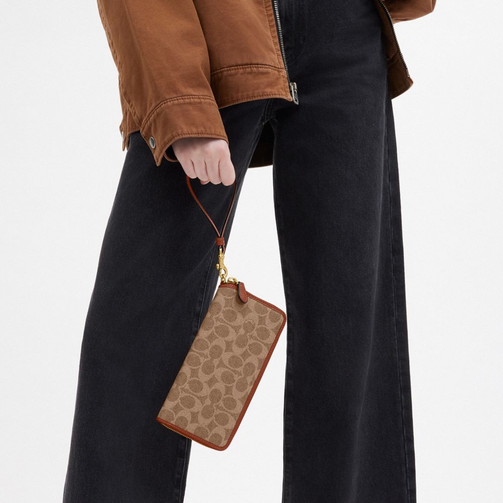 Coach Essential Continental Wallet In Signature Canvas Brass Tan Caramel