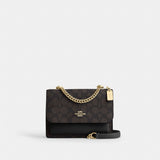 Coach Mini Klare Crossbody Bag In Signature Canvas Gold Walnut Black