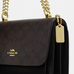 Coach Mini Klare Crossbody Bag In Signature Canvas Gold Walnut Black