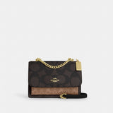 Coach Klare Crossbody Bag In Blocked Signature Canvas Gold Walnut Tan
