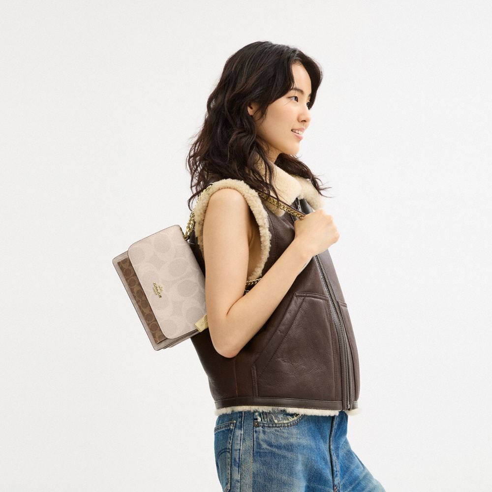 Coach Klare Crossbody Bag In Blocked Signature Canvas Gold Sand Tan