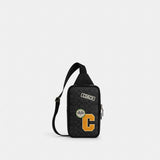 Coach Sullivan Pack In Signature Canvas With Patches Gunmetal Charcoal Multi