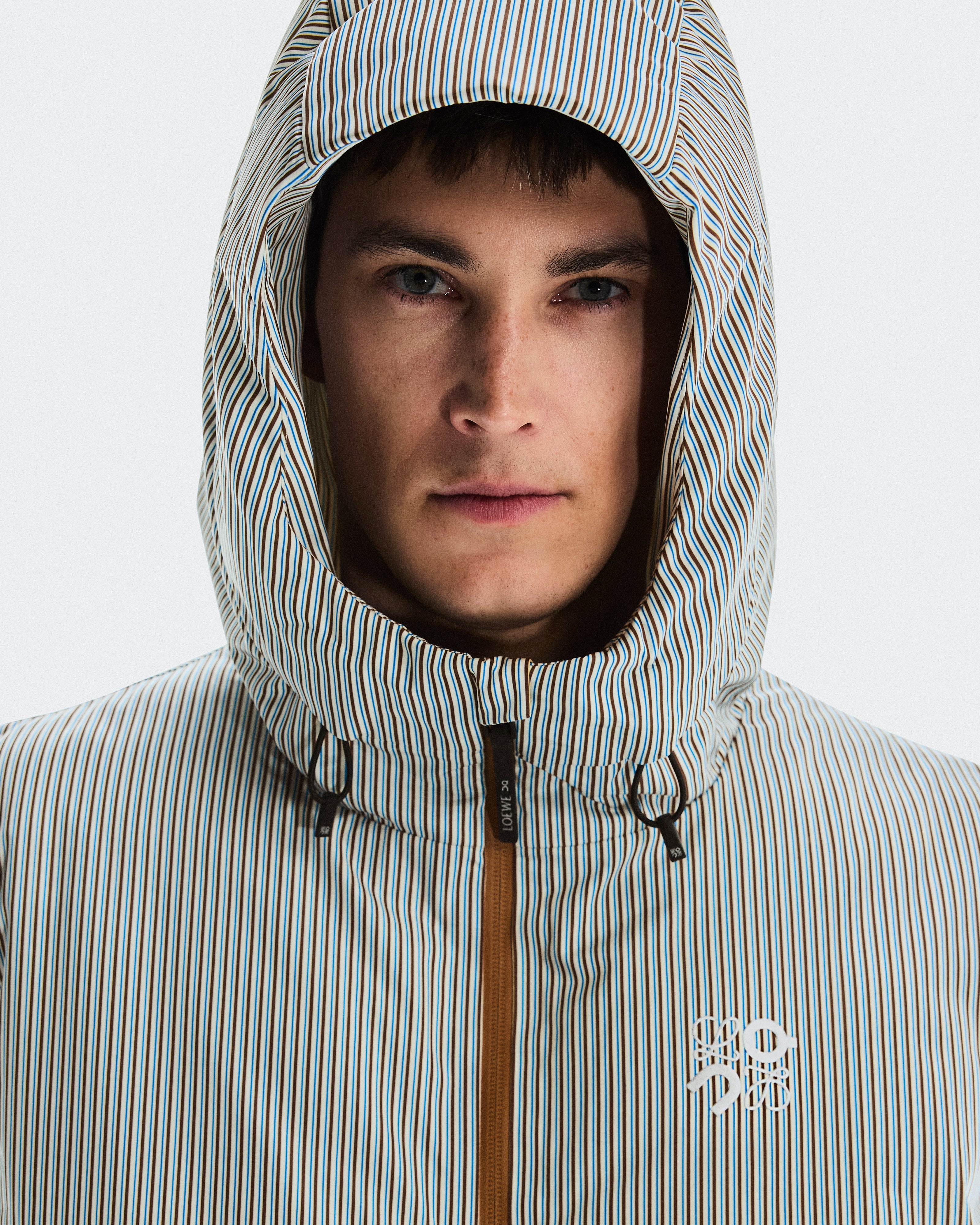 On Puffer Vest Loewe Beige | Blue